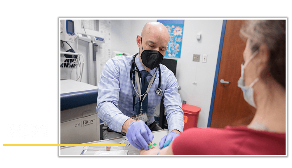 2021 | Patient receiving COVID-19 vaccine via the GW Vaccine Research Unit